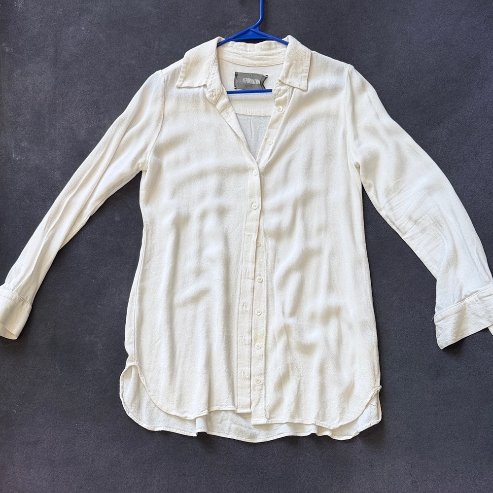 Elegant Cream Button-Up Blouse reformation